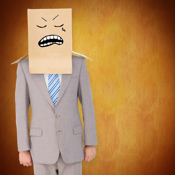 Anonymous businessman against orange — Stock Photo, Image