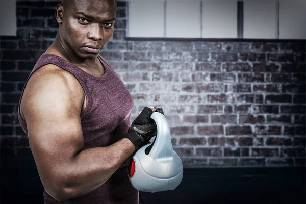 Fit man exercising with kettlebell — Stock Photo, Image
