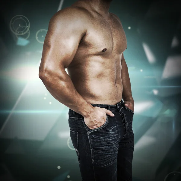 Muskularny mężczyzna nosi niebieskie dżinsy — Zdjęcie stockowe