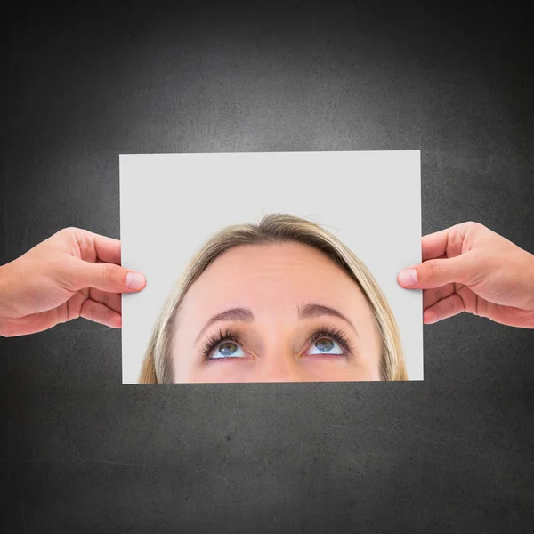 Hands showing photo of eyes — Stock Photo, Image