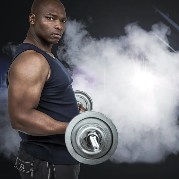 Fit man lifting heavy barbell — Stock Photo, Image