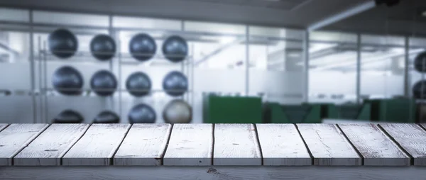 Composite image of wooden desk — Stock Photo, Image