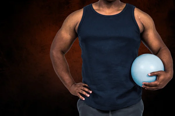 Muscular man working out with weight — Stock Photo, Image