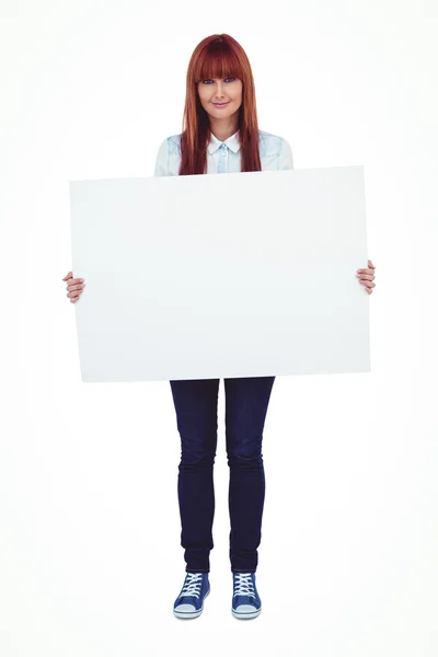 Attractive hipster woman holding white card — Stock Photo, Image