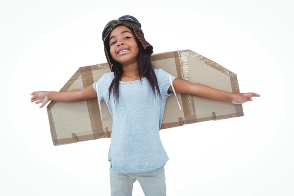 Girl with fake wings pretending to be pilot — Stock Photo, Image