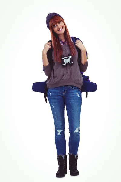 Smiling hipster woman with a travel bag — Stock Photo, Image