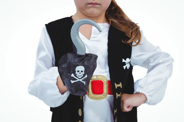 Девушка в маске, притворяющаяся пиратом — стоковое фото