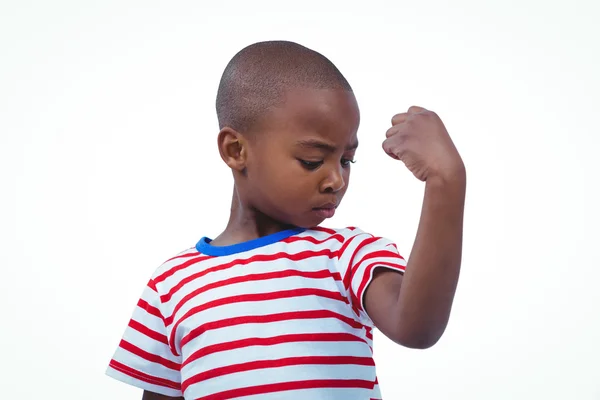 Boy looking his biceps — Stock Photo, Image