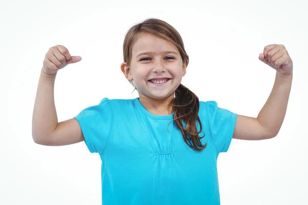 Cute girl showing biceps — Stock Photo, Image
