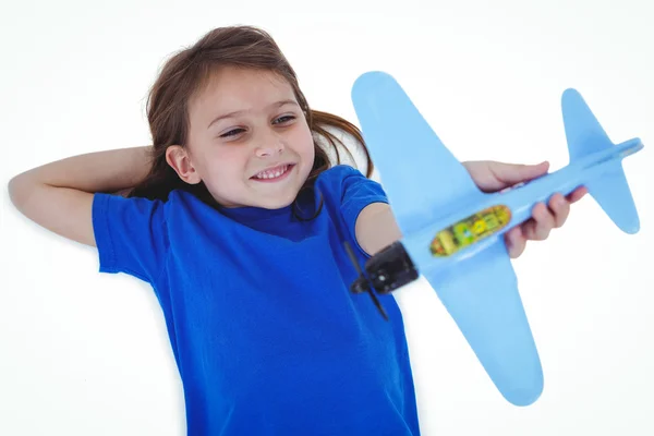 Linda chica jugando con el avión — Foto de Stock