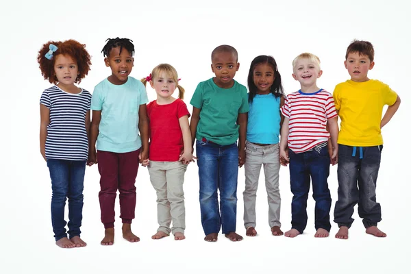 Cute kids blote voeten kijken camera — Stockfoto