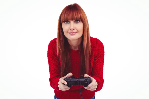 Smiling hipster woman playing video games — Stock Photo, Image