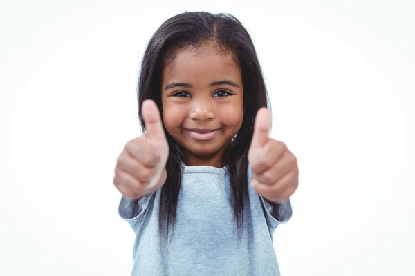 Sorrindo menina mostrando polegares para câmera — Fotografia de Stock