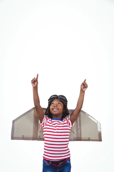 Smiling boy pretending to be pilot — Stock Photo, Image