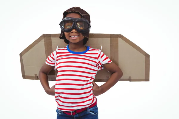 Smiling boy pretending to be pilot — Stock Photo, Image