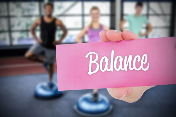 Balance against people background — Stock Photo, Image