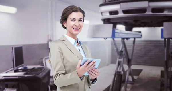 Smiling businesswoman holding digital tablet — Stock Photo, Image