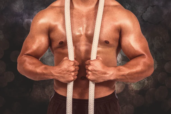 Muskulös man med slaget rep — Stockfoto