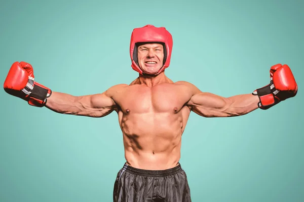 Kazanan boksör uzanmış kollarıyla — Stok fotoğraf