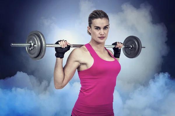 Mujer en forma con barra —  Fotos de Stock