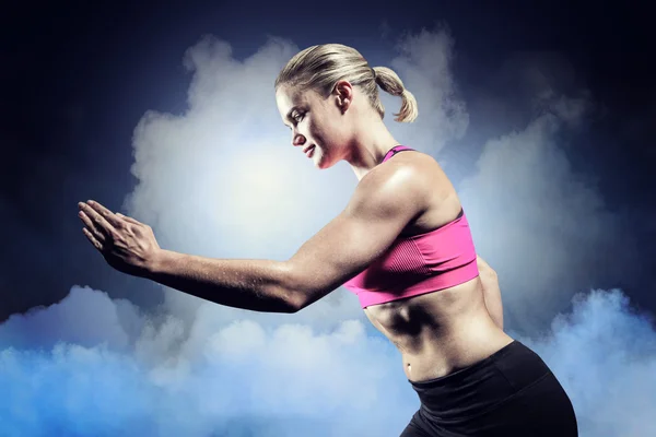 Muscular woman running in sportswear — Stock Photo, Image