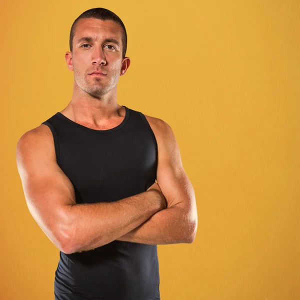 Confident athlete with arms crossed — Stock Photo, Image