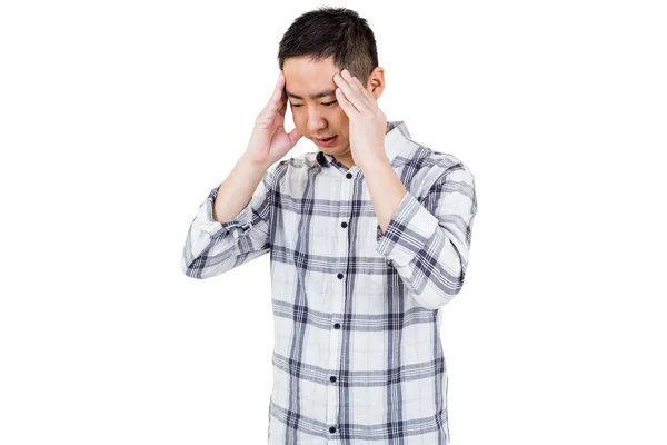 Asian man getting a headache — Stock Photo, Image