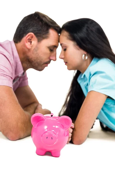 Worried couple laying on the floor — Stock Photo, Image