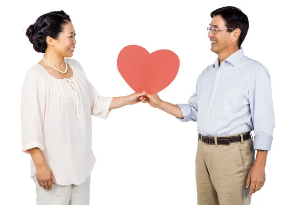 Più vecchio asiatico coppia holding cuore — Foto Stock