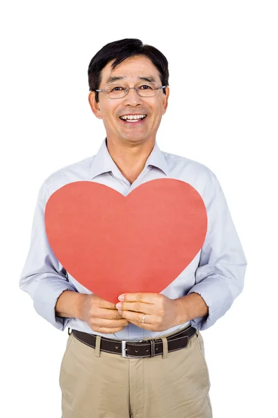 Äldre asiatiska man visar hjärta — Stockfoto