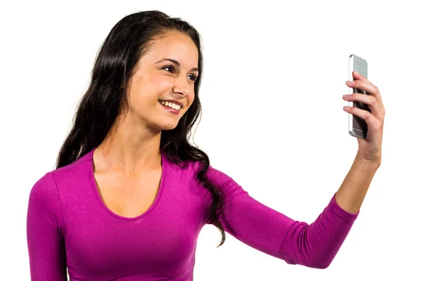 Smiling woman taking selfie — Stock Photo, Image