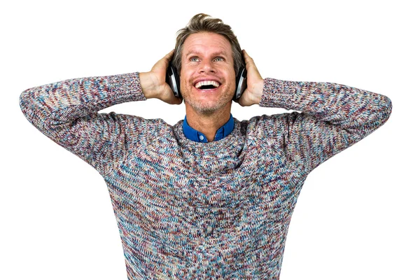 Happy man listening to music — Stock Photo, Image