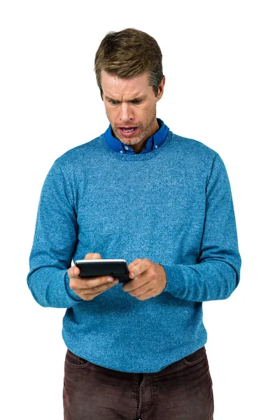 Close-up of man surprised by using calculator — Stock Photo, Image