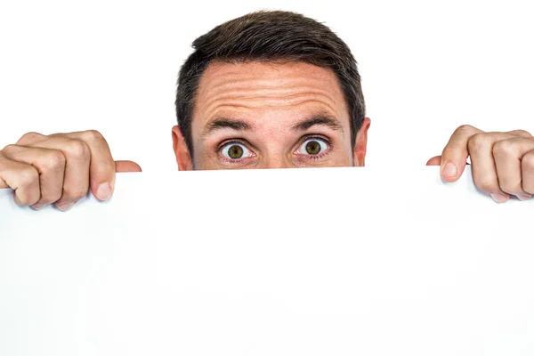 Man holding blank sheet — Stock Photo, Image