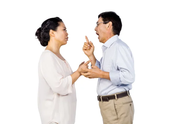 Äldre asiatiska par med ett argument — Stockfoto