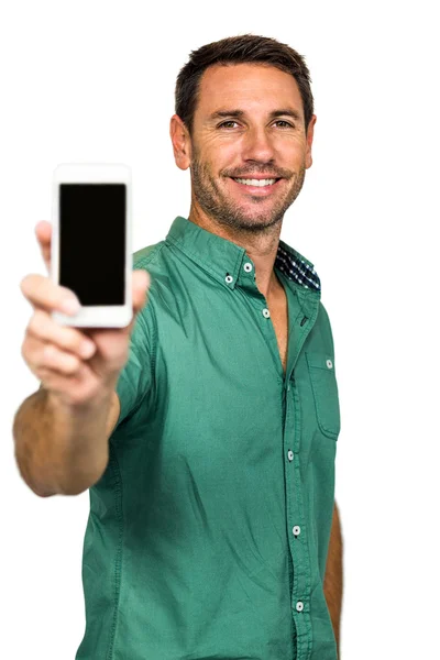 Sorridente homem segurando smartphone — Fotografia de Stock