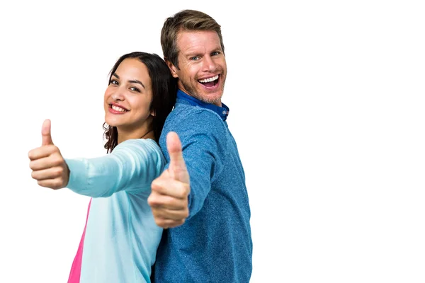 Smiling couple gesturing ok sign — Stock Photo, Image