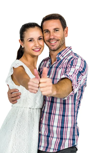 Giovane coppia mostrando pollici in su — Foto Stock