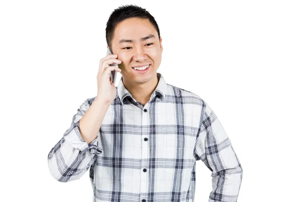 Ασιατική άνθρωπο πραγματοποίηση μιας τηλεφωνικής κλήσης — Φωτογραφία Αρχείου