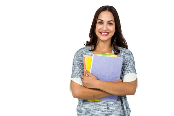 Porträtt av leende kvinna anläggning böcker — Stockfoto