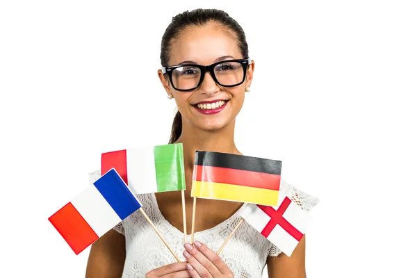 Mujer joven con gafas con banderas — Foto de Stock