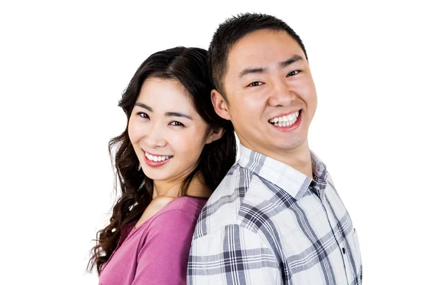 Asian couple smiling at camera — Stock Photo, Image