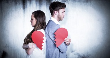 smiling couple holding red heart shape clipart