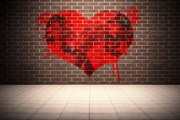 Heart against room with brick wall — Stock Photo, Image