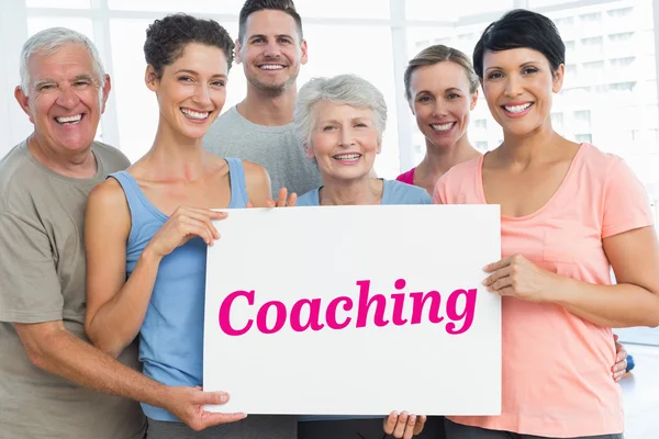 Coaching against grey wall — Stock Photo, Image