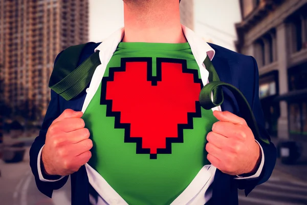 Businessman opening shirt in superhero style — Stock Photo, Image