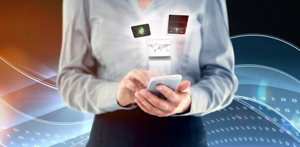 Businesswoman using smart phone — Stock Photo, Image