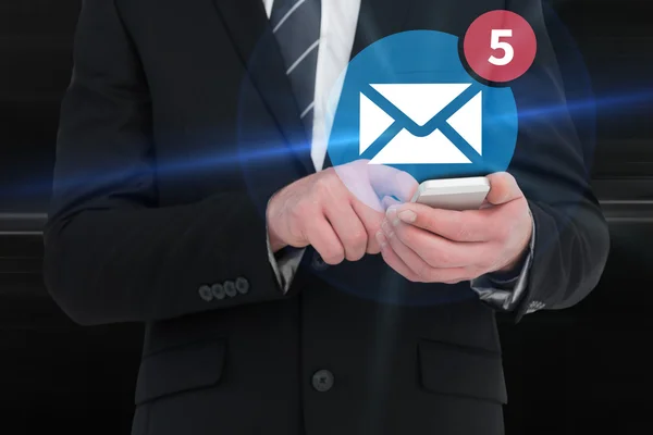 Businessman sending a text message — Stock Photo, Image