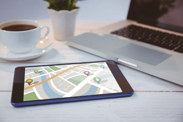 Map app against tablet — ストック写真