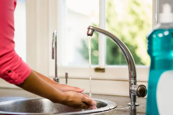 Woman washing hands — Stock Photo, Image